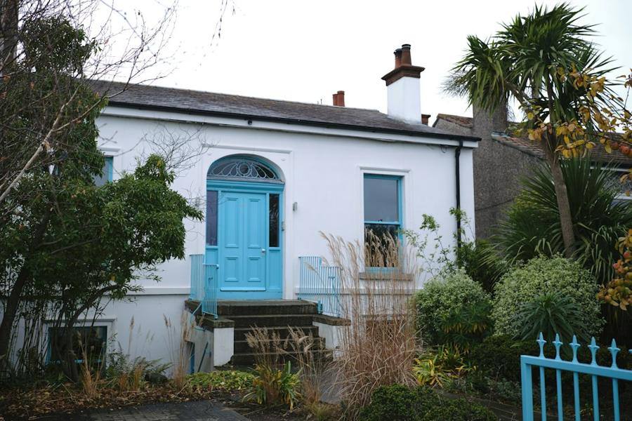 White Dublin house with a blue front door
